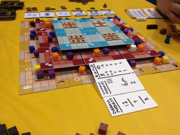 To end Friday I was able to get my game design, Ziggurat, on the table. The honorable Adam McIver, Kerry Rundle, and J. Alex Kevern were excellent playtesters.